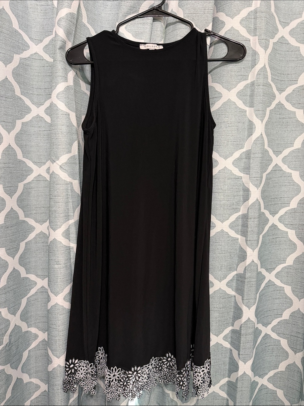 Sleeveless Black Dress with White Floral Hem